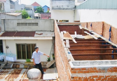Xây nhà lấn sang đất của hàng xóm, xử lý